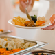 Illustration for article titled Wedding guest absconds with 10 containers of food, floral centerpieces